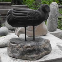 black granite and base of found stone 21 x 18 x 9 inches