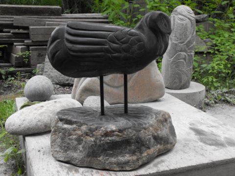 black granite and base of found stone 21 x 18 x 9 inches