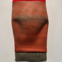 2024 rubber, fabric, on wood 27 x 10 x 2 inches